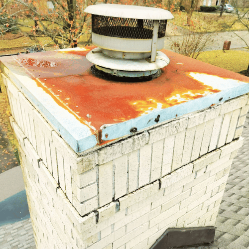 Rusty chimney chase pan